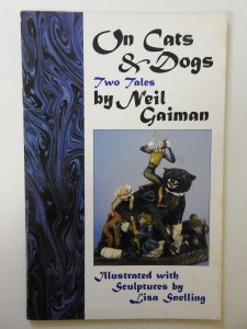 On Cats and Dogs Two Tales VG Condition sticker on bc