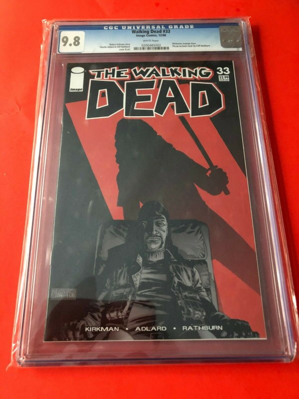 THE WALKING DEAD #33  CGI 9.8  WHITE  12/06  / MICHONNE REVENGE //  KEY