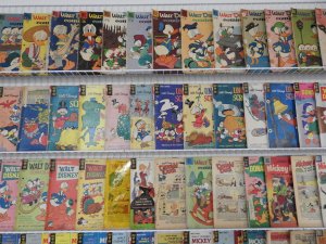 Huge Lot of 160+ Comics W/ Bugs Bunny, Mickey Mouse, Tom and Jerry +More!