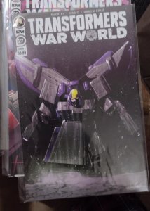 TRANSFORMERS   # 27  A  2020  IDW   WAR WORLD