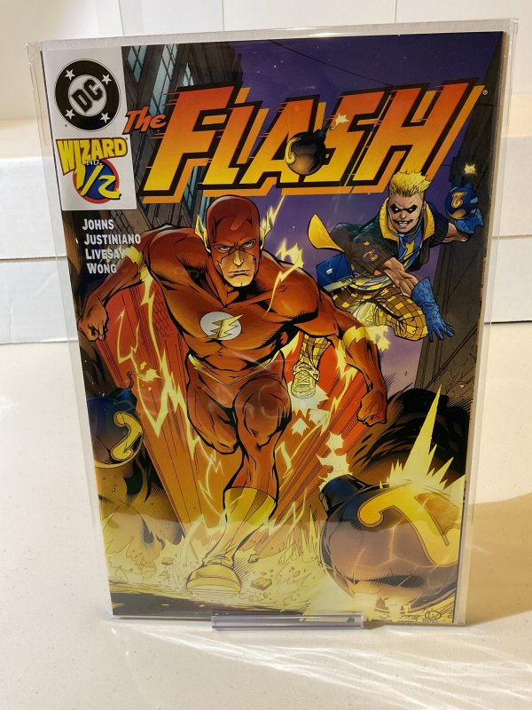 Flash #1/2  Wizard Exclusive w COA!  2005  9.0 (our highest grade)  Geoff Johns!