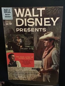 Walt Disney Presents #4 (1960) high-grade Leslie Nielsen photo cover! VF/NM