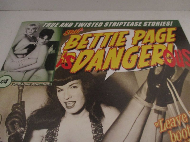 Bettie Page in Danger #4 (2012)Adult Comic Book SHH Grade NM+ 9.6 w/Glasses