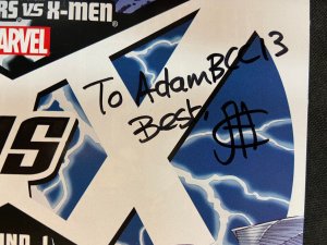A VS X (AVENGERS VS. X-MEN) SIGNED BY JIM CHEUNG (9.2)