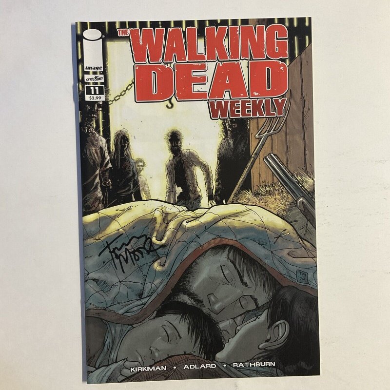 Walking Dead Weekly 11 2011 Signed by Tony Moore Image Skybound NM near mint