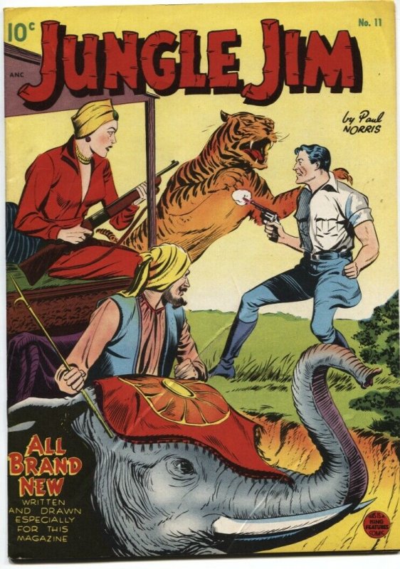 JUNGLE JIM #11-1949-FIRST ISSUE-TIGER & ELEPHANT COVER-PAUL NORRIS ART-STANDARD