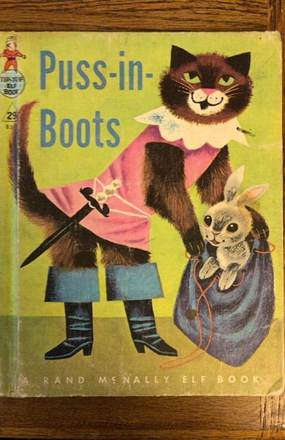 Puss-in-boots,1955,Rand McNally, hole in one page,glued tear