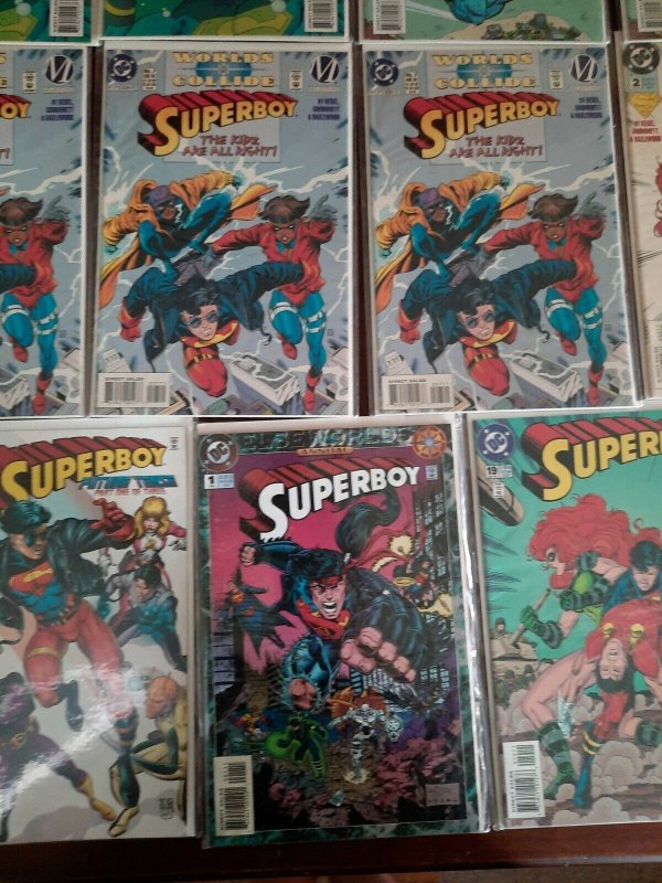 Lot of 21 DC Comic Books Superboy 1990s board and bagged duplicates