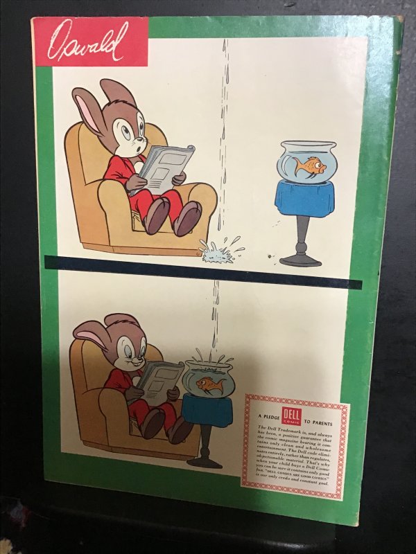 Four Color #697 (1956) mid grade Oswald the rabbit key! FN- Walter Lantz!