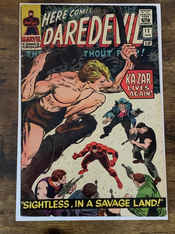 Daredevil #12 (1966). Fine. 1st app Plunderer. Kirby/Romita-a begins.