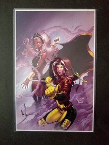 Storm & Rogue-Mint Condition 11 x 17 print signed by Norman Lee