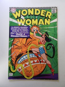 Wonder Woman #166 (1966) VG+ condition bottom staple detached from cover