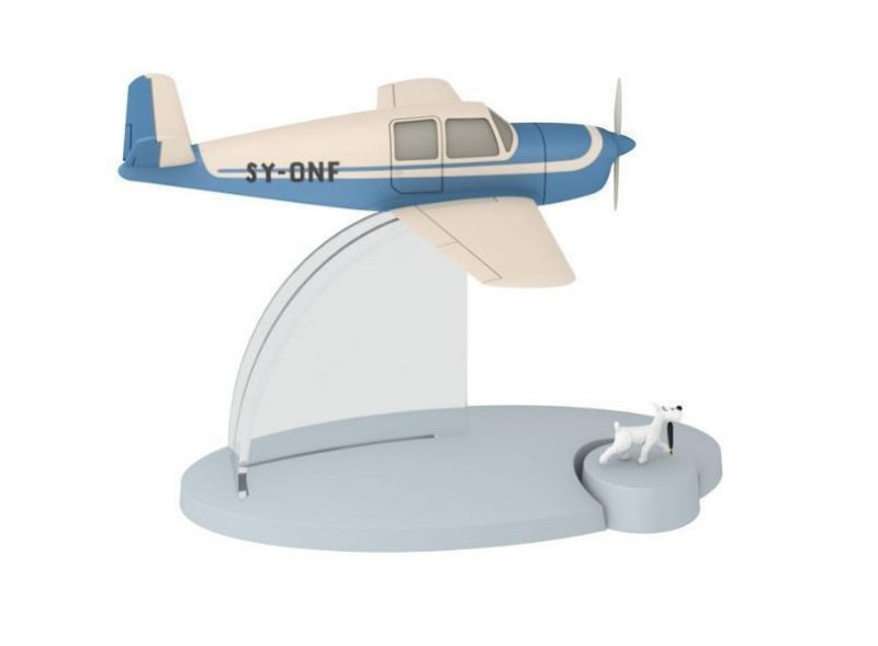 Avion Tintin con figura Milu: avion BEECHCRAFT 35 BONANZA del album El asunto...