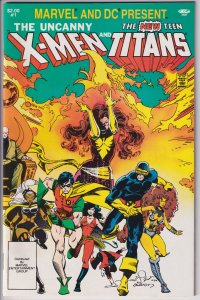 MARVEL AND DC PRESENT #1 (1982) X-MEN and the NEW TEEN TITANS. NM 9.4, white!