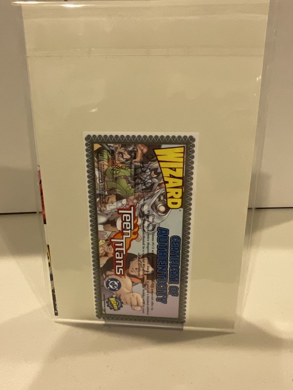 Teen Titans #1/2 Wizard Special  2004 9.0 (our highest grade)  Sealed with COA!