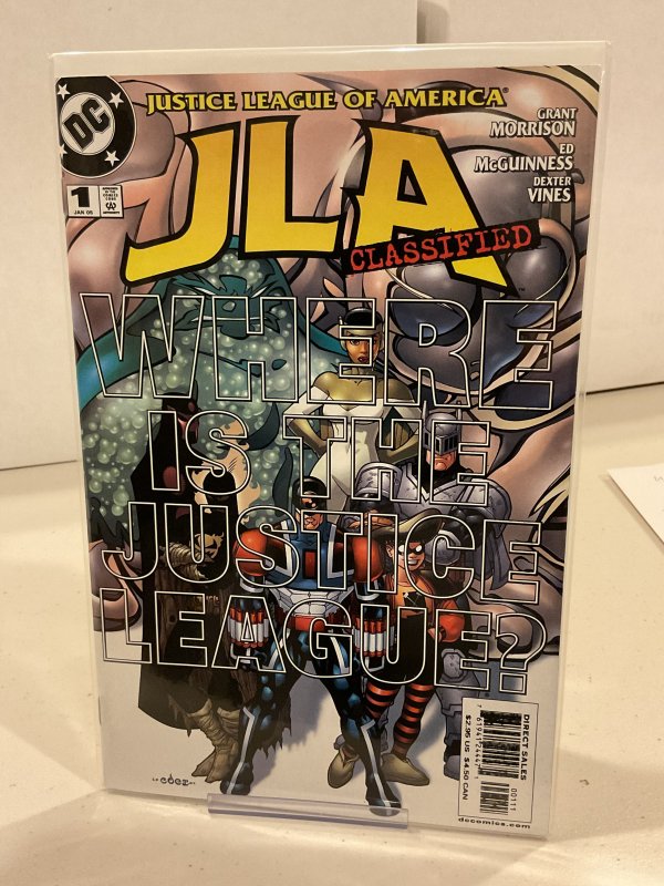 JLA Classified #1  9.0 (our highest grade)  2004  Grant Morrison! Ed McGuinness!