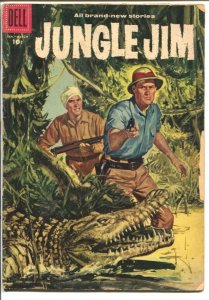 Jungle Jim #12 1957-Dell-painted cover-jungle thrills-alligator attack-G/VG