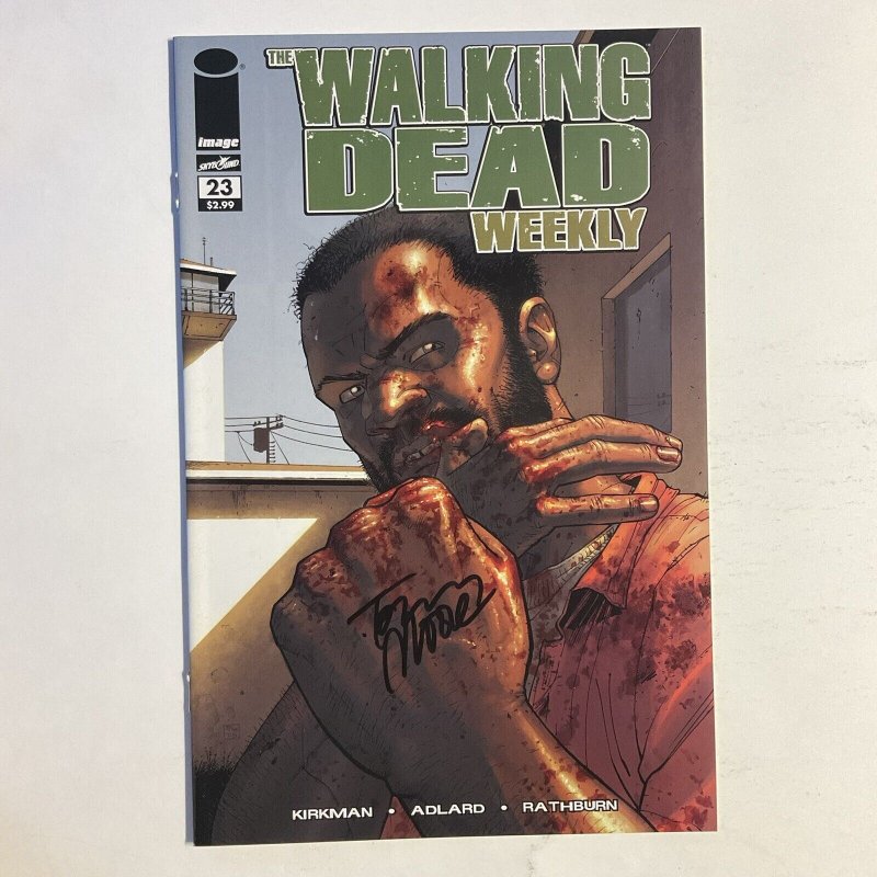 Walking Dead Weekly 23 2011 Signed by Tony Moore Image Skybound NM near mint