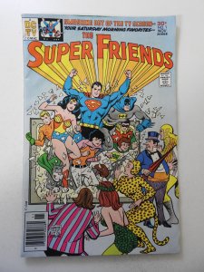 Super Friends #1 (1976) VG Condition moisture stain, rust on staples