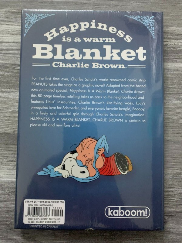 2011 PEANUTS Happiness is a Warm Blanket by CHarles M Schulz HC SEALED Kaboom!