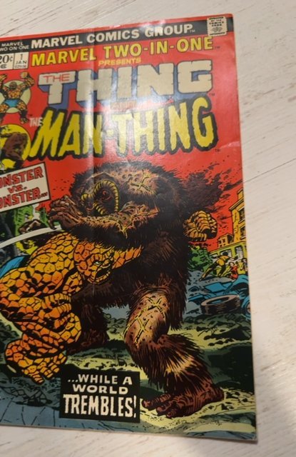 Marvel Two-in-One #1 (1974)vs the man-thing small 1 tear back cover