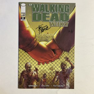 Walking Dead Weekly 21 2011 Signed by Tony Moore Image Skybound NM near mint