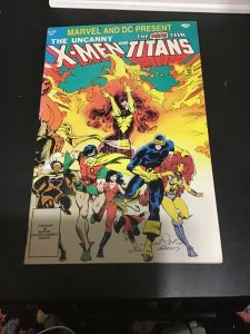 z Marvel,  DC Present featuring  X-Men, Titans 1982 Dark Phoenix, Darkseid VF/NM