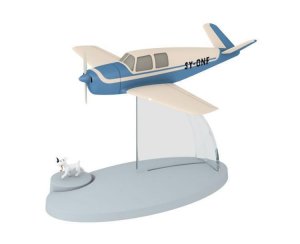 Avion Tintin con figura Milu: avion BEECHCRAFT 35 BONANZA del album El asunto...