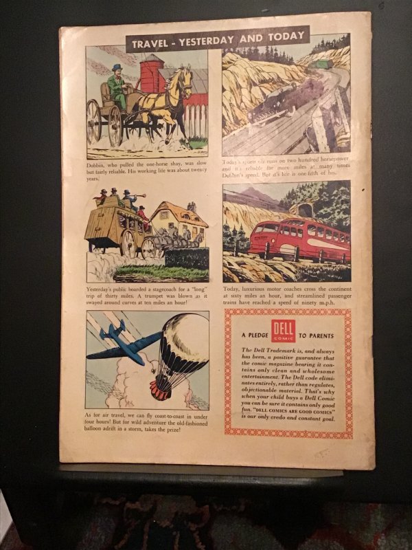 Four Color #784 (1957). Around the world in 80 days! Mid high grade FN+ Wow!