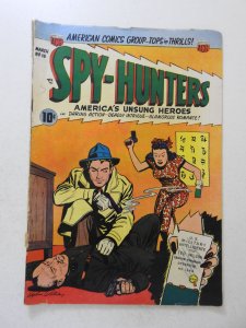 Spy-Hunters #16 (1952) GD+ Condition cover detached, 1 in spine split