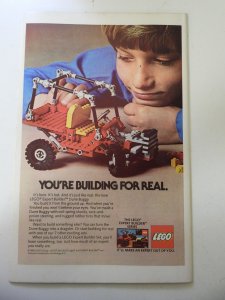 Spider-Woman #48 (1983) VG+ Condition Centerfold detached at bottom staple