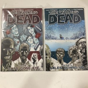 THE WALKING DEAD TPB LOT OF 2 NM NEAR MINT 1 2 TONY MOORE IMAGE