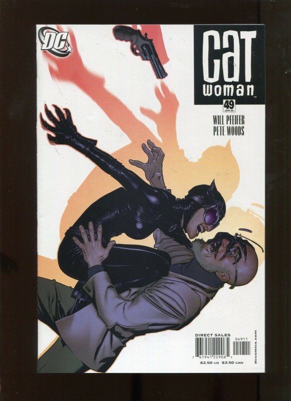 CATWOMAN #49 (9.2) HUGHES CATWOMAN ATTACKING COVER