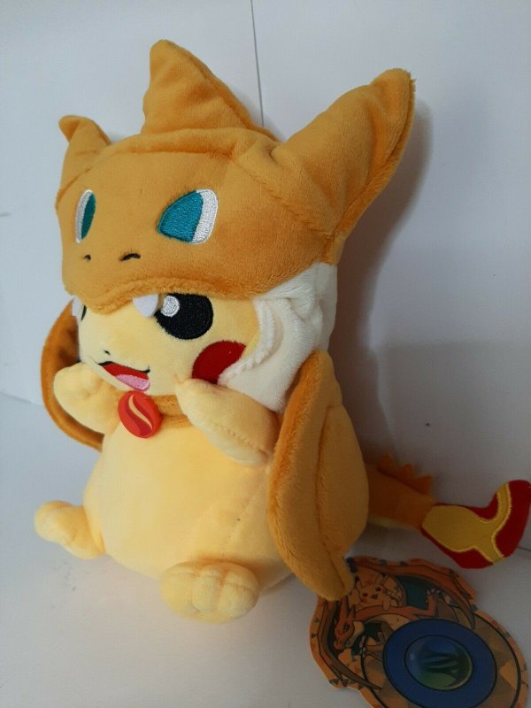 Japanese Exclusive Original Plush Pikachu wearing a Mega Charizard Y Poncho 8