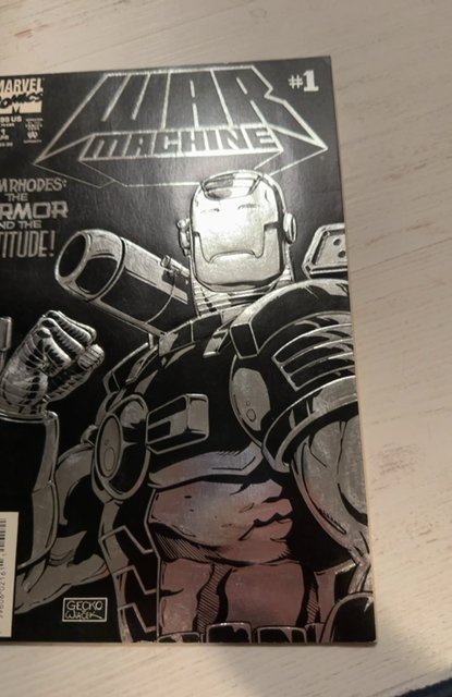 War Machine #1 (1994) his own title- 2 spine breaks. 1 indentation