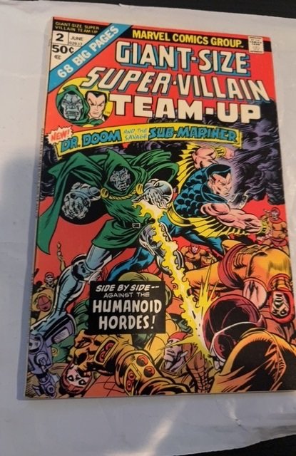 Giant-Size Super-Villain Team-Up #2  (1975)side by side with the human horde