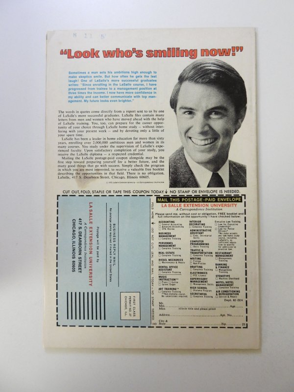 Defenders Annual (1976) FN/VF condition stamp,stain back cover