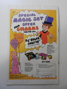 Super Friends #1 (1976) VG Condition moisture stain, rust on staples