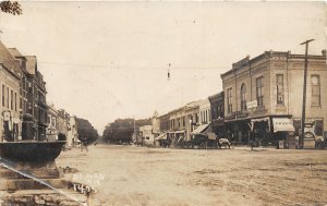 G34/ Delavan Wisconsin RPPC Postcard 1910 Main Street Stores Wagons