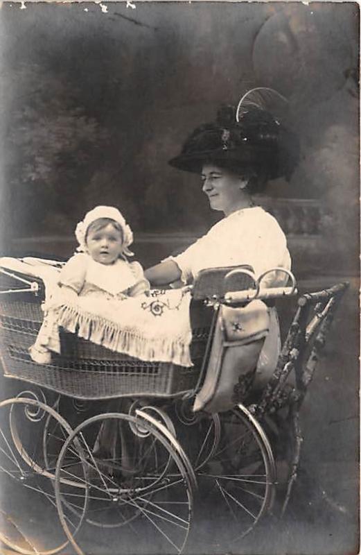 Mother with child in a stroller Child, People Photo 1914 oxidation from age