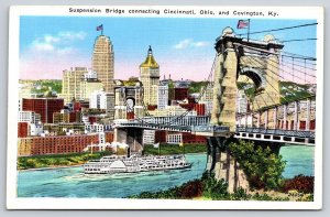 Cincinnati OH~Suspension Bridge~Riverboat~Flag~City Skyline~Linen 1940s Postcard
