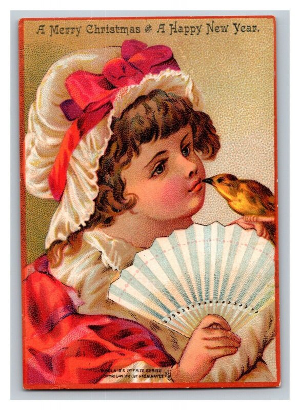 Vintage 1880's Victorian Trade Card Merry Christmas - Girl Kisses a Yellow Bird