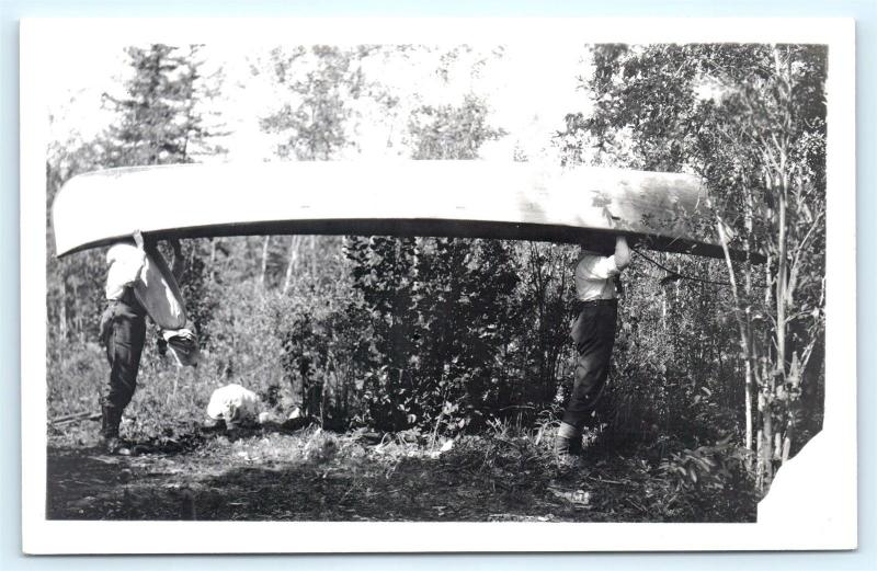 Postcard Two Men Carrying a Large Canoe RPPC Real Photo c1930s L16