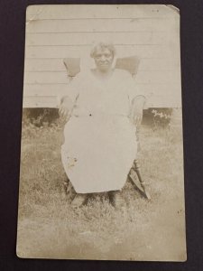 Early 1900's RPPC Postcard Real Photo African-American woman in rocking chair