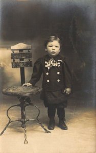 RPPC Real Photo,c.'07, Ransom,KS, Dressed Up Child Wire Chair, Old Postcard