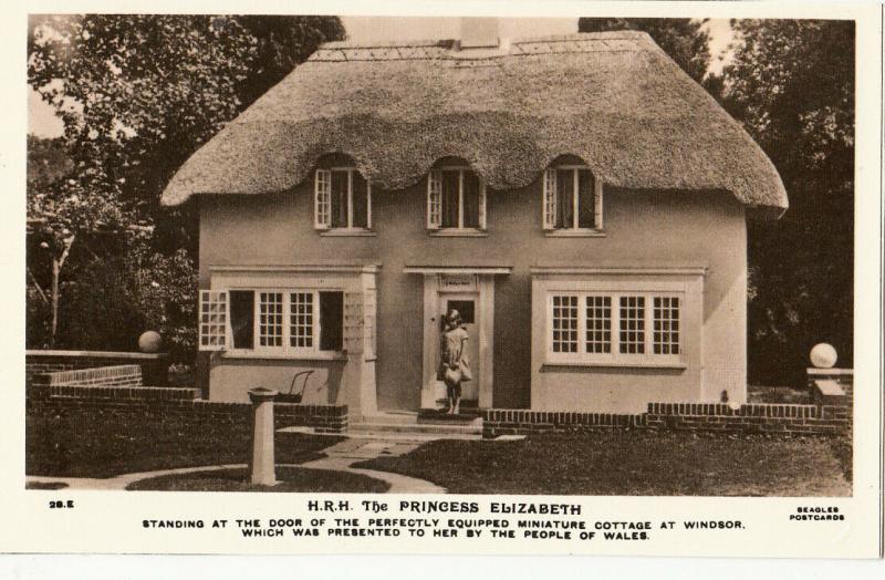 Royalty The Princess Elisabeth standing at the door of Miniature Cottage Windsor