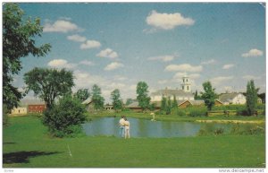 Young Couple enjoy the View across the Pond, UPPER CANADA VILLAGE, MORRISBURG...