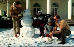 President Reagan Making Snowman With His Grandchildren Ashley and Cameron