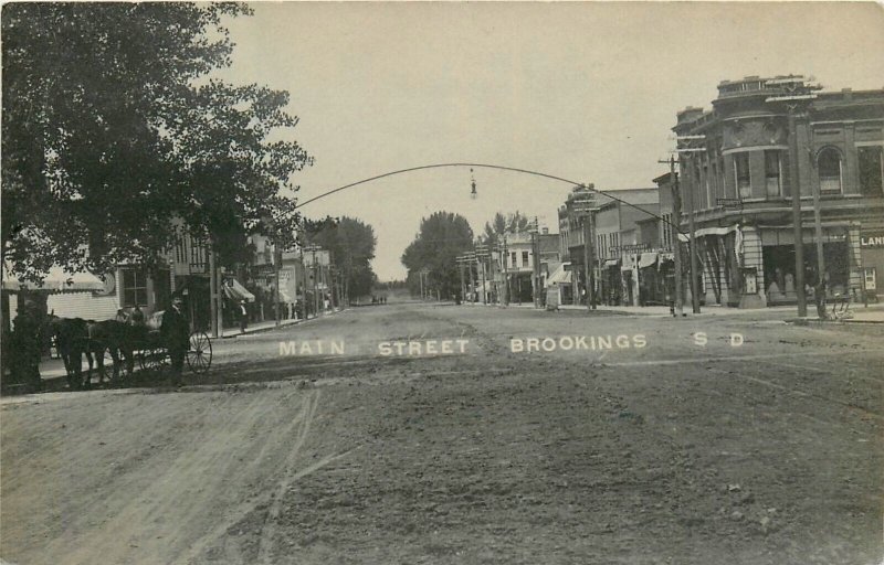 Postcard RPPC C-1910 South Dakota Bookings Main Street horse drawn SD24-4887