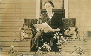 Porch Swing woman reading 1922  Mrs. Sally Brown RPPC Photo Postcard 21-13298